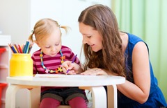 Young mother and her little daughter drawing together; Shutterstock ID 61699324; PO: The Huffington Post; Job: The Huffington Post; Client: The Huffington Post; Other: The Huffington Post